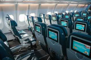 What is the difference between KLM Economy Class, Premium Comfort Class, and Business Class?